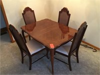 gloss hardwood finish dining table
