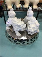 White ceramic foo dogs