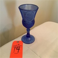 blue stemmed coin glass