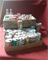 2 wooden soda crates, old soda cans from Iraq