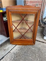 Vintage glass front corner cabinet with shelves