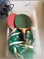 ping pong paddles and net