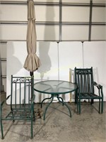 Green metal and glass patio set with umbrella