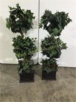2 fake decorative house plants.