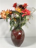 Pottery vase with silk flowers