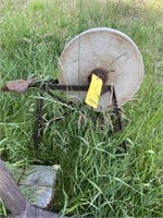 Antique sharpening stone and stand