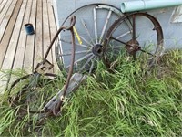 Ore bucket frame and 2 old wheels