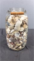 Large Glass Jar Full Of Sea Shells