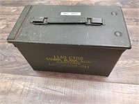 Large metal ammunition can with several gun cleani