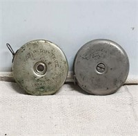 Lot of 2 small metal round tape measures