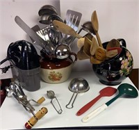 Box of kitchen utensils with crocks and an