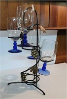 Wine glasses on wire display holder