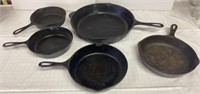 5 piece cast iron - not signed