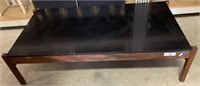 MID CENTURY COFFEE TABLE WITH BLACK TOP