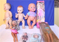 Lot of  older baby dolls.   Alexander Barbie More