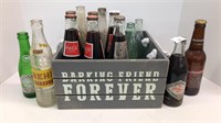 Wood crate with bottles: Coca-Cola, Crass, Pepsi,