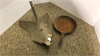 (1) cast iron skillet (1) cast iron spade for