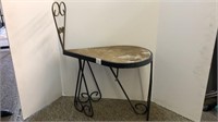 Wrought iron chair with wood seat