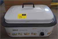 Nesco 18 Qt. Roaster Oven with Mason Jars inside