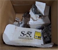 Box of Universal Pipe Clamps and S-5-V Clamps