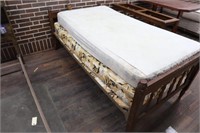 Twin bed with mattresses