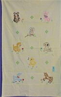 CHILD's QUILT WITH CROSS STITCHED ANIMALS