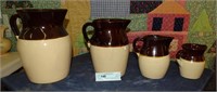 SET OF 4 BROWN & WHITE PITCHERS 10" to 5"