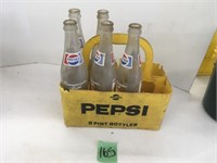 Ne. collectable pepsi bottles in carrier