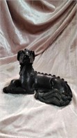 Bronze dog sculpture