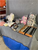 Quantity of knitting supplies including needles