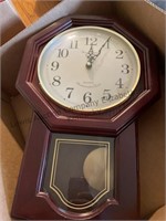 Quartz pendulum  clock.