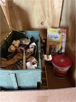 Old tackle box with some bolts and wall anchors