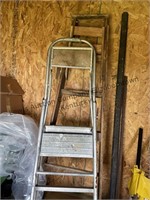 2 ladders. One wooden 6ft. Metal 4 ft step ladder