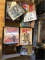 2 boxes of assorted books. Hunting- survival-