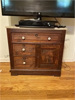 Old cabinet with heavy marble top. Drawers