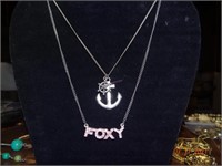 Foxy and Ancor with Ship Wheel necklaces