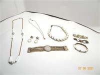 Variety of Gold and White Jewelry