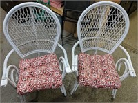 Two wicker patio chairs with cushions 26"W x 45"H