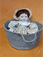 Collector doll in beautiful woven basket