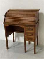 Antique wooden roll-top writing desk