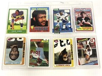 Eight assorted football cards UNAUTHENTICATED
