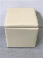 Cream colored vinyl storage ottoman