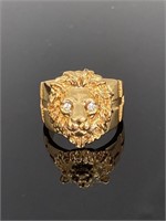 Gold toned lion ring with gem eyes