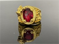 Gold toned Dragon ring with oval red stone