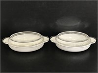 Two Corningware glass casserole dishes w/ lids