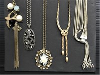 Five vintage necklaces