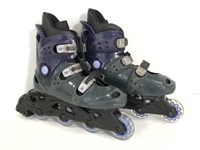 XCS purple and gray roller skates
