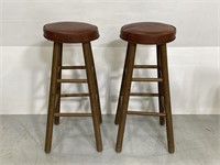 Pair of vintage wood stools w/ vinyl cushion tops