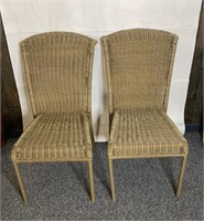 Pair of plastic wicker chairs 34” tall