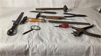 Vintage tools including napping hammer, leather